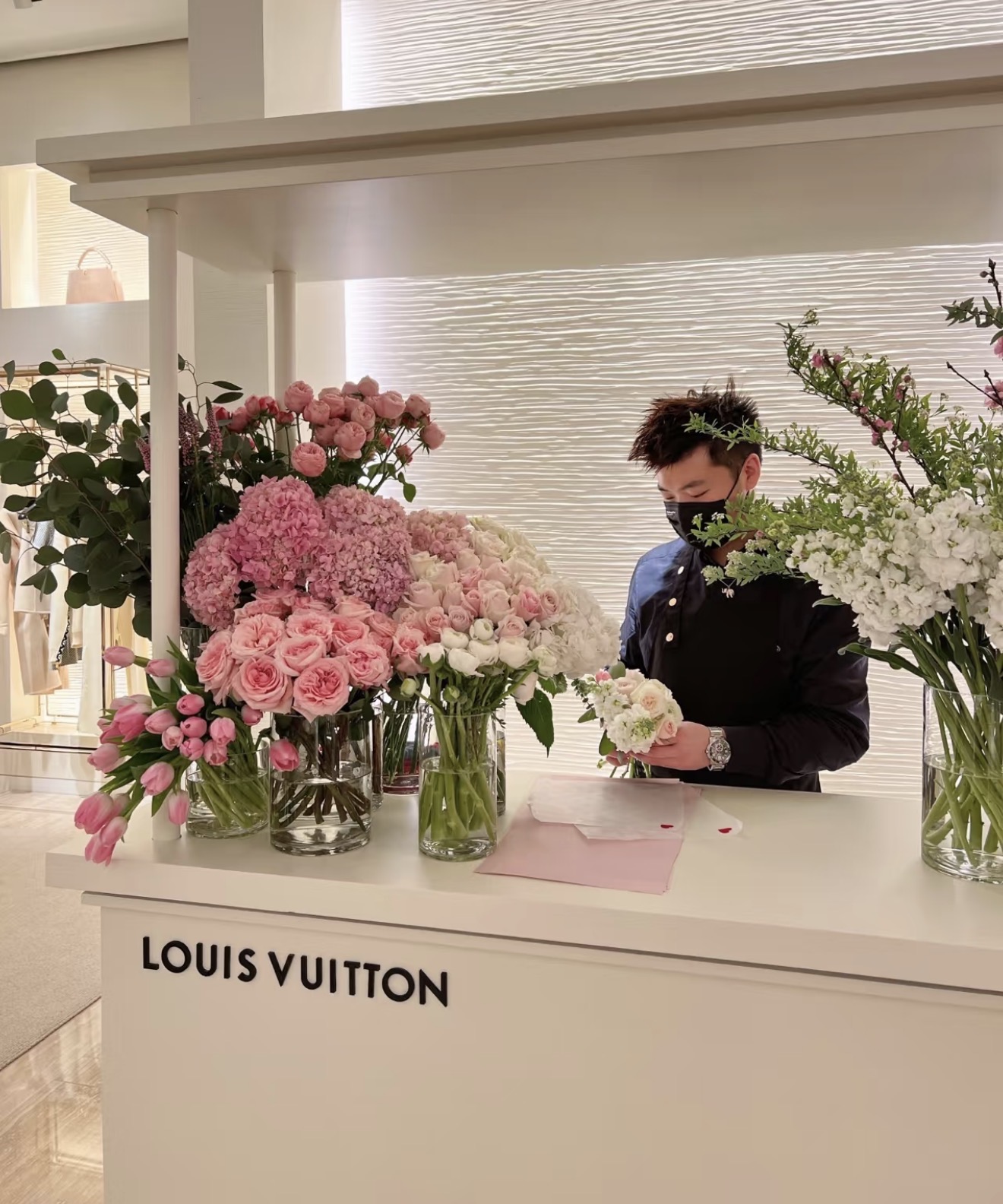 Louis Vuitton in-store flower gifting reference